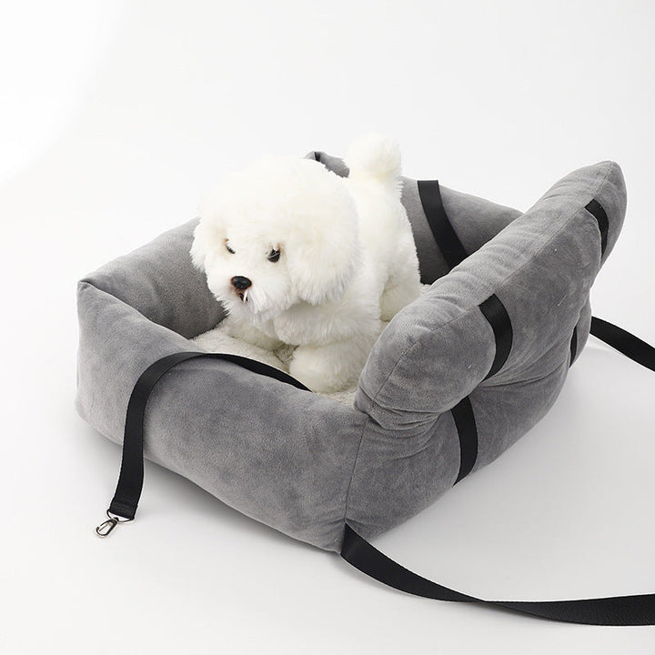 Pet travel gear: dog booster seat designed for car safety, preventing distractions while driving.