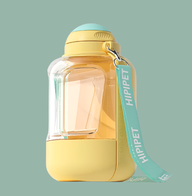 Durable, leakproof dog water bottle with attached food bowl, ready for adventure