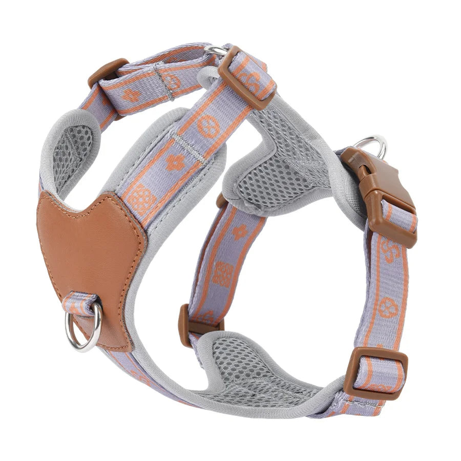 Close-up of the breathable mesh on a black adjustable dog harness, suitable for active dogs.