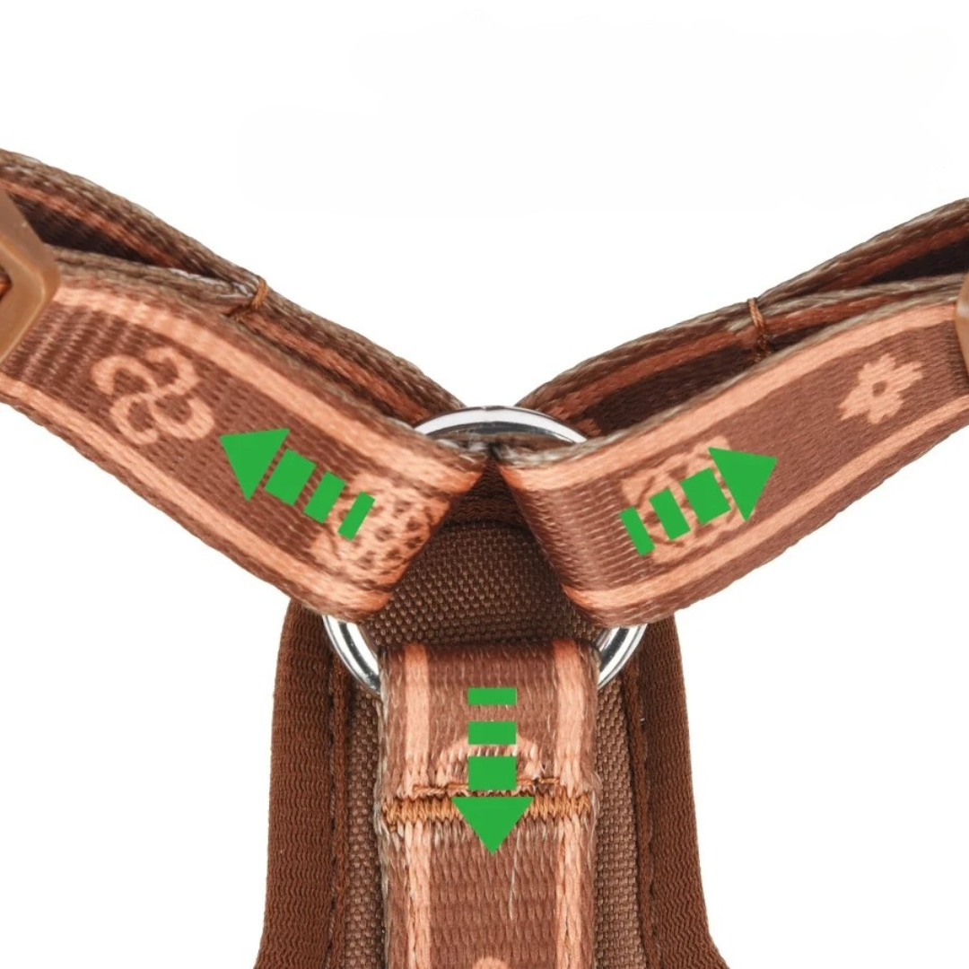 Top-down view of an adjustable dog harness in purple, showcasing the multi-point adjustability and mesh.