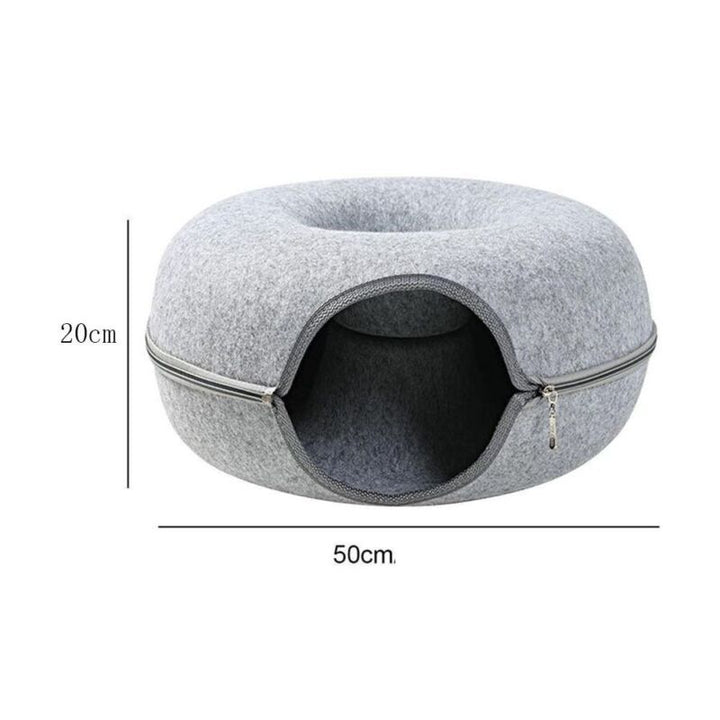 Comfortable pet furniture: donut cat bed transforms into a cozy cave, perfect for resting