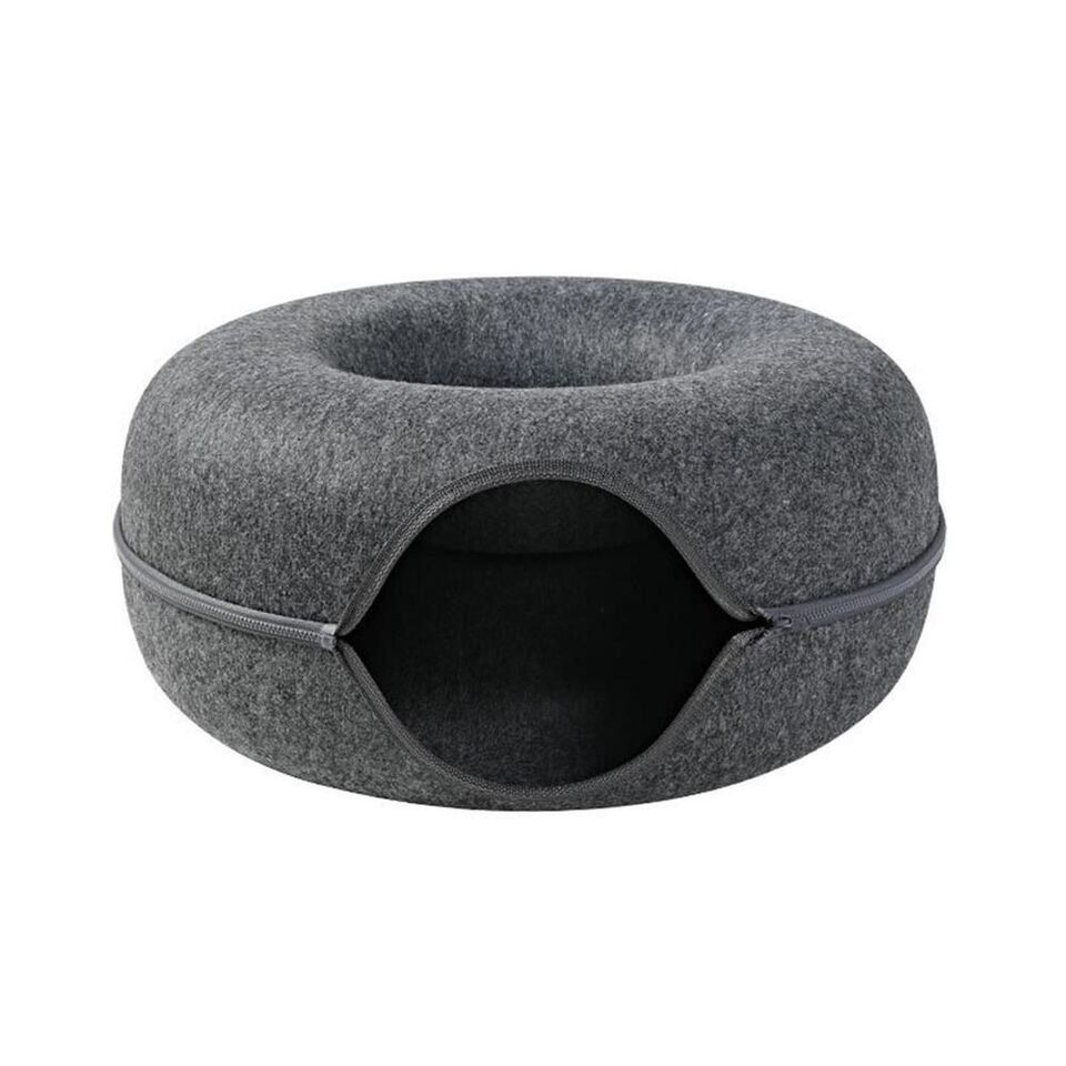 Luxurious donut cat bed, offering a cozy cave sanctuary for felines; machine washable
