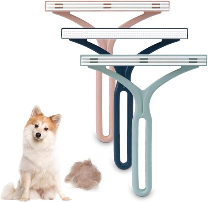 Double-sided manual pet hair remover brush for efficient dog and cat hair removal from upholstery.
