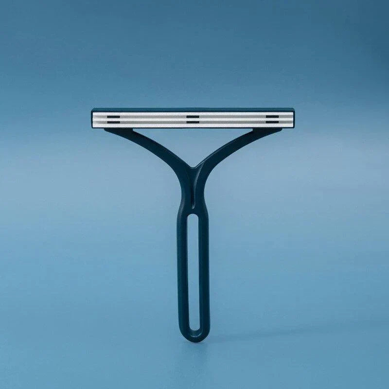 Pet hair removal tool, two-sided, for quick cleaning of dog and cat fur from home textiles.