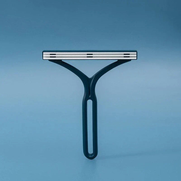 Pet hair removal tool, two-sided, for quick cleaning of dog and cat fur from home textiles.