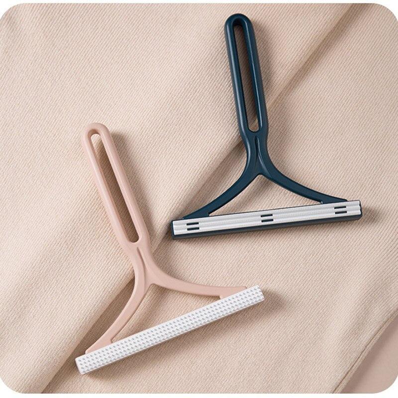 Household pet hair remover, featuring a double-sided design for effective dog and cat hair cleanup.