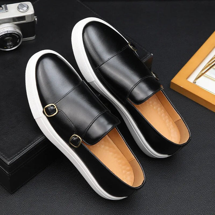 Comfortable men's slip-on loafers with monk strap detail, versatile for both casual and formal styles.