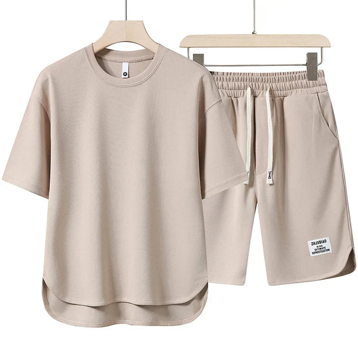 Stylish unisex varsity oversized top and shorts set for ultimate summer comfort.