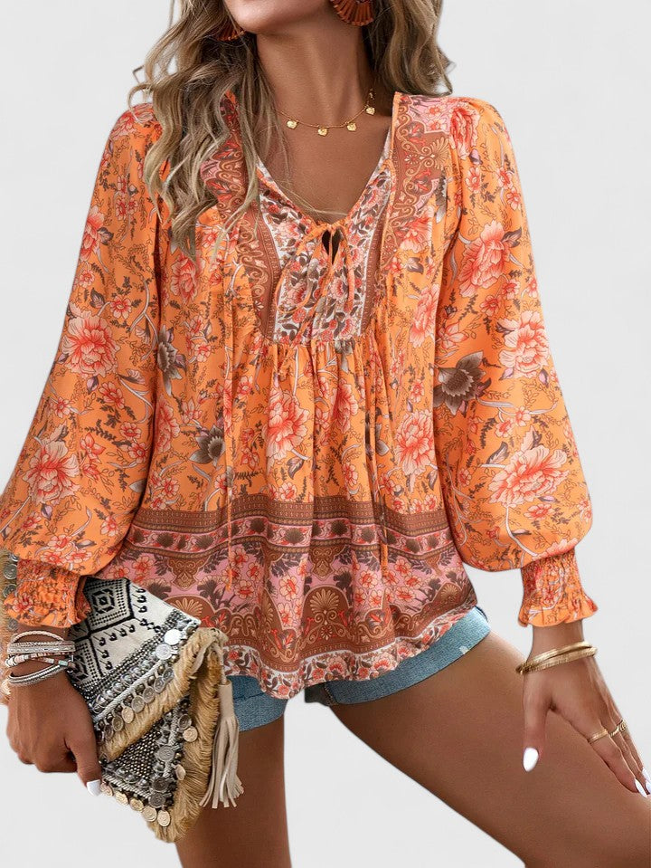 Feminine long sleeve floral peasant top for women, dreamy boho style, casual summer fashion.