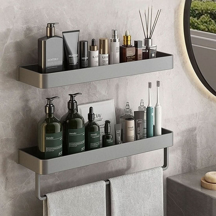 Sleek modern bathroom wall shelf with towel bar, ideal for drill-free, space-saving storage.