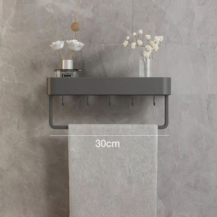 Space-saving drill-free bathroom wall shelf & towel bar for efficient home storage organization.