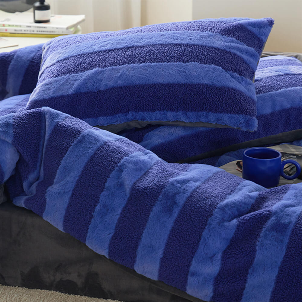 Bedroom decor with a cozy striped bed sheet set, velvet touch, sherpa warmth