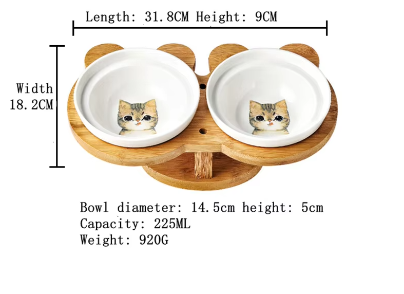 Stylish cat accessory: two ceramic bowls in an elevated bamboo feeder, promoting better digestion.