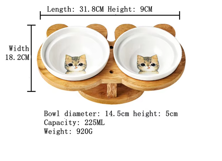 Stylish cat accessory: two ceramic bowls in an elevated bamboo feeder, promoting better digestion.
