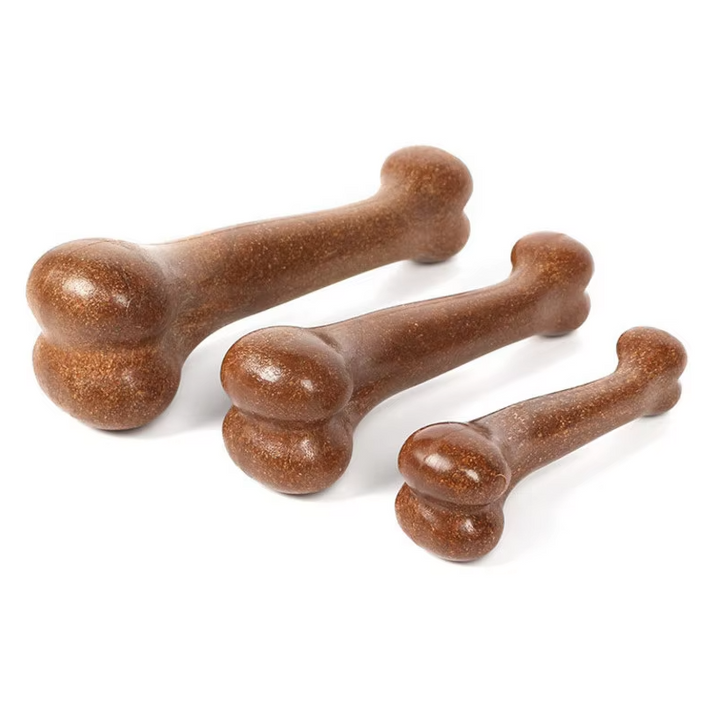 Happy dog chewing an eco-friendly dental bone, promoting clean teeth & fresh breath