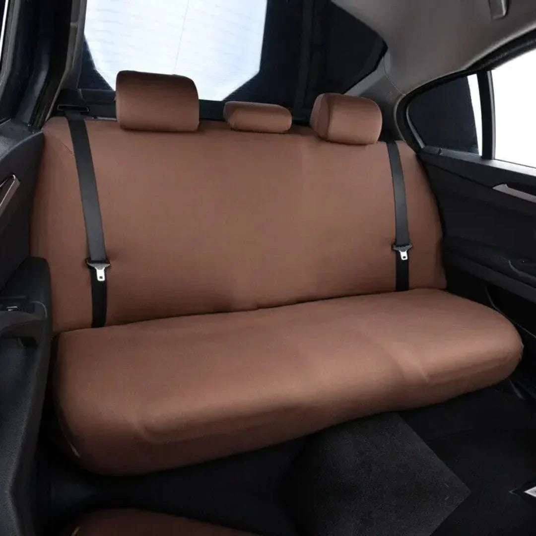 Durable black dog hammock car seat cover, waterproof & scratch-proof for pet travel safety in car backseat.