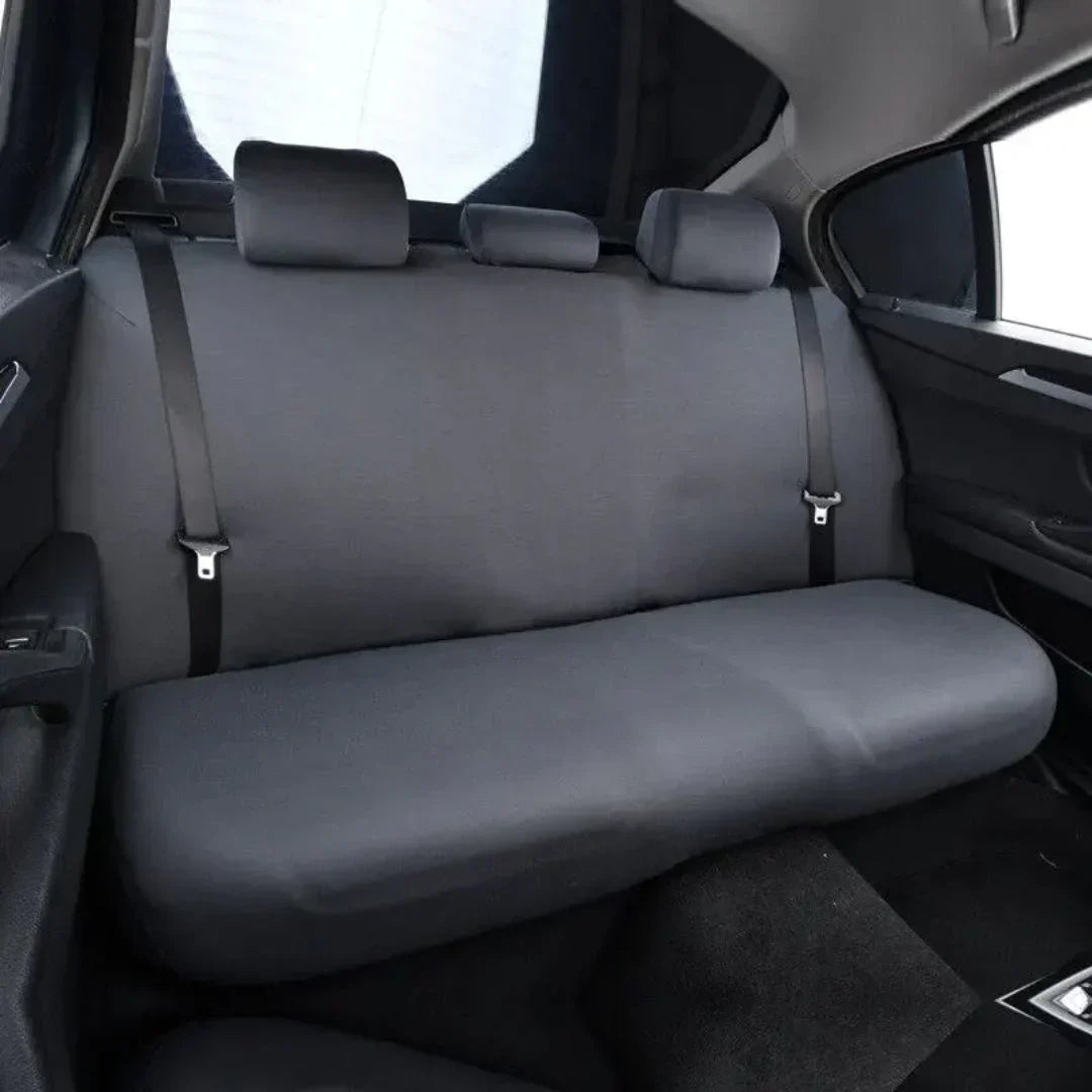 Foldable black car backseat dog hammock cover, showcasing easy storage and portability for pet supplies.