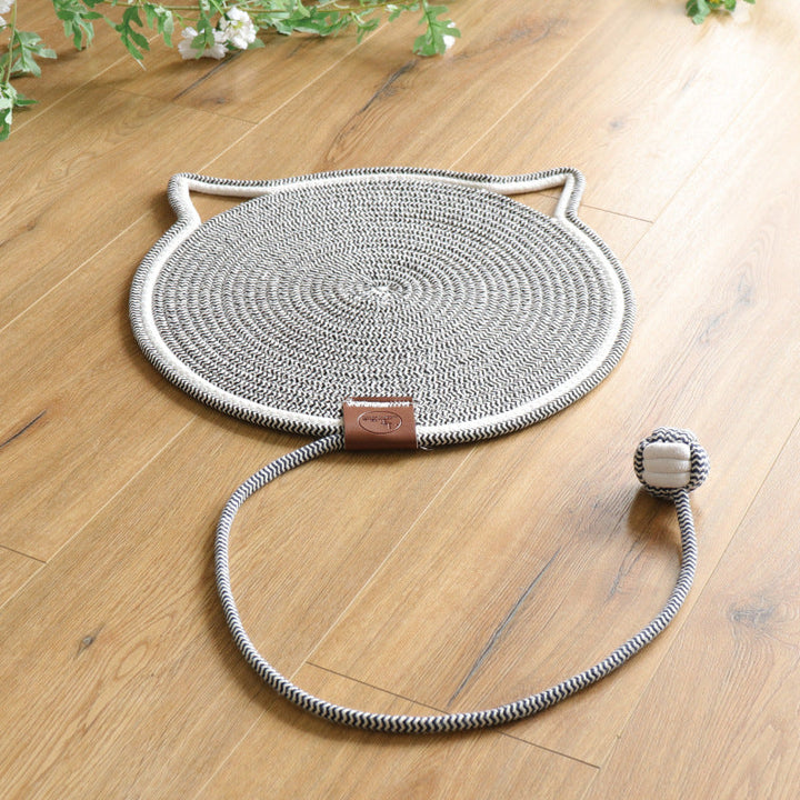 Cat happily lounging on a premium cat scratcher mat, showing its modern design.
