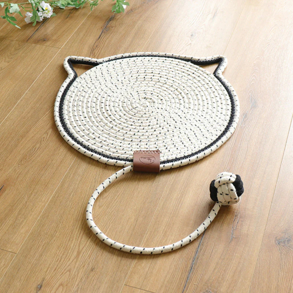 Cat scratching mat on a hardwood floor, blending with home decor, durable design.