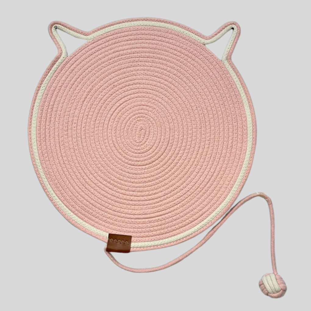 Feline accessories: cat scratching rug, protects floors and entertains cats.