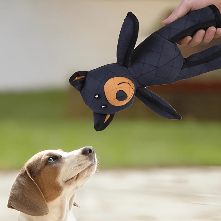Soft plush dog toy designed for cuddling and gentle play, a comforting companion for your pet's relaxation.