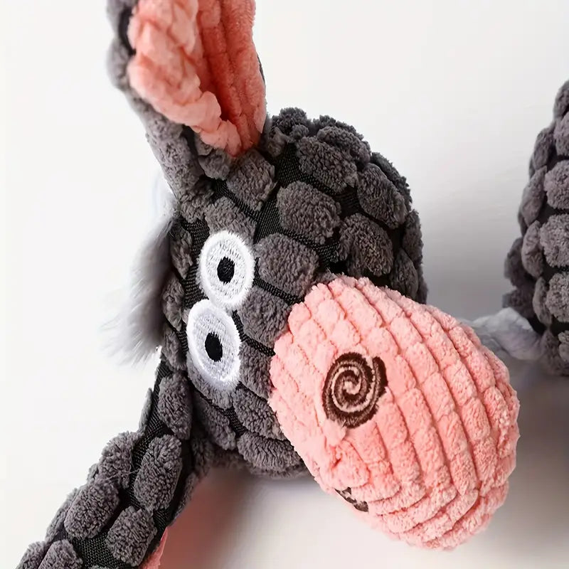 A collection of durable corduroy dog toys in assorted colors with squeakers for pets