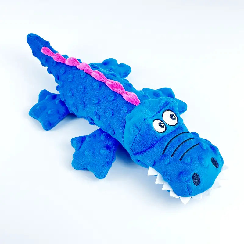 Durable crocodile plush dog toy for aggressive chewers, squeaky and pet-safe fun.