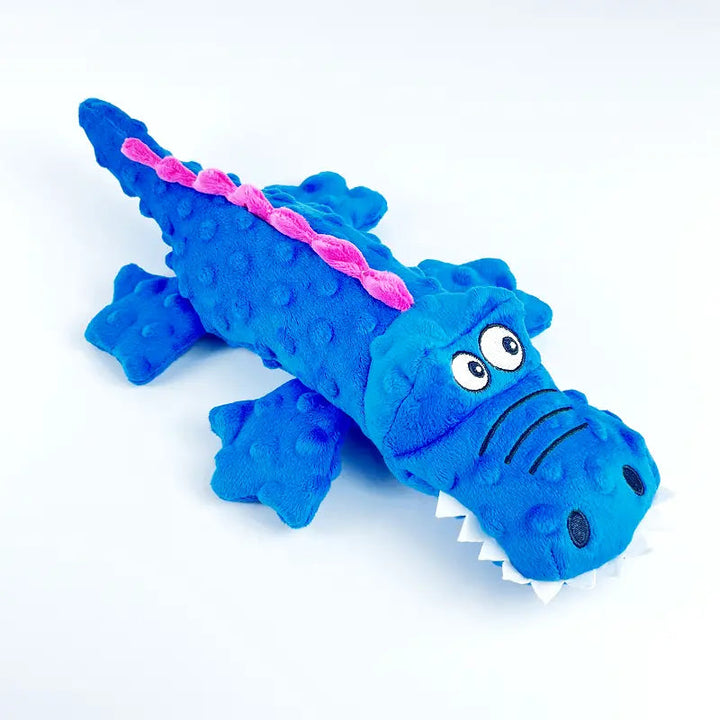 Durable crocodile plush dog toy for aggressive chewers, squeaky and pet-safe fun.