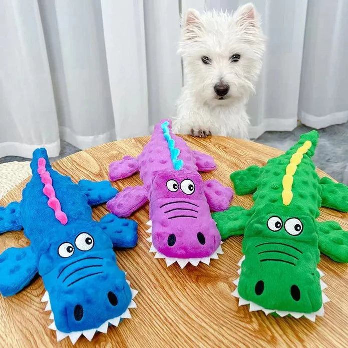 Green crocodile chew toy with squeaker, designed for powerful and aggressive dog chewers.