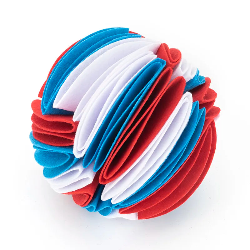 Close-up of a rugged canvas chew ball, an essential pet supply for dog dental health.