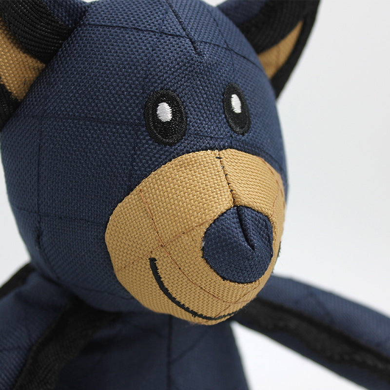 Close-up of a durable dog squeaky chew toy, reinforced fabric for aggressive chewers.