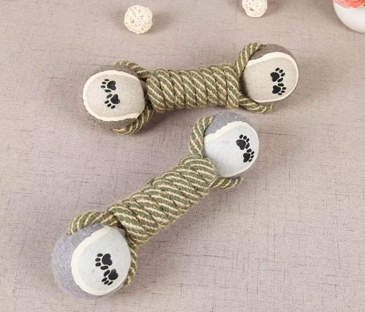 Dog chew toy featuring a sturdy rope and orange paw print ball, perfect for aggressive chewers & dental care.
