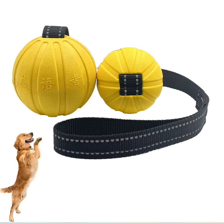 Bright red interactive dog chew toy tug ball for playful pet training sessions