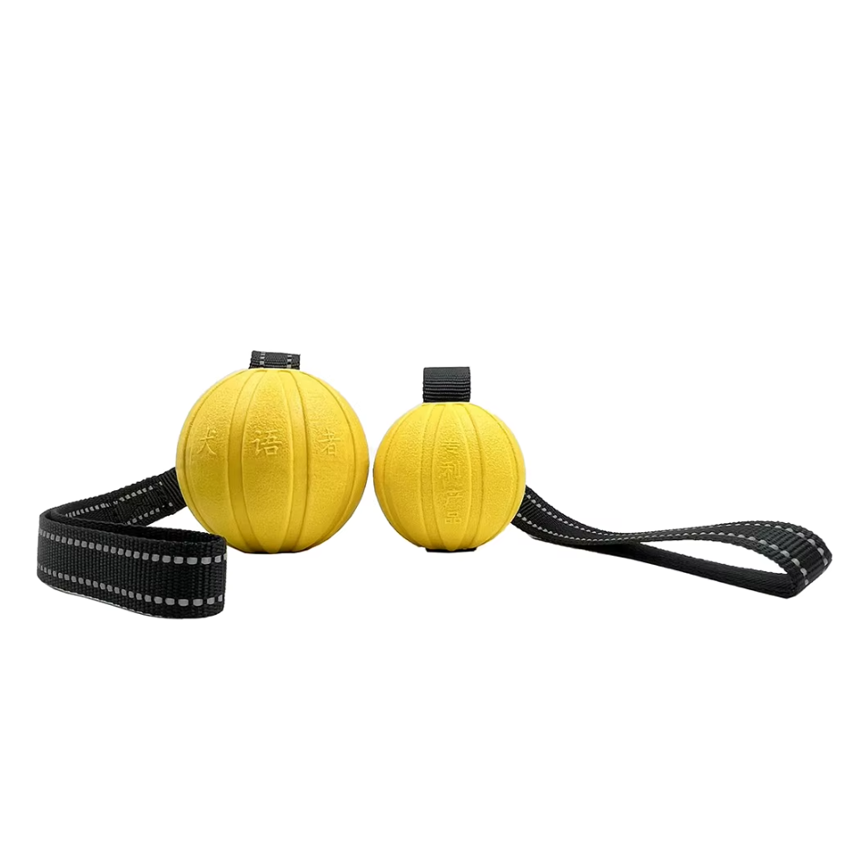 Close-up of textured interactive dog chew toy tug ball promoting dental health