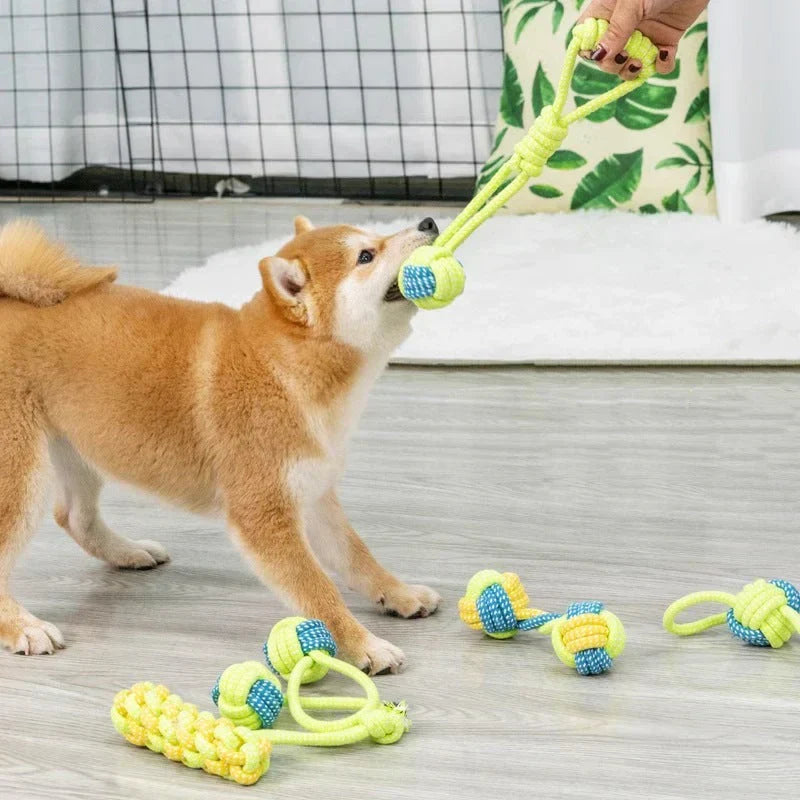 Knotted rope dog toy with fringe ends, perfect for tug-of-war and keeping dog's teeth clean.