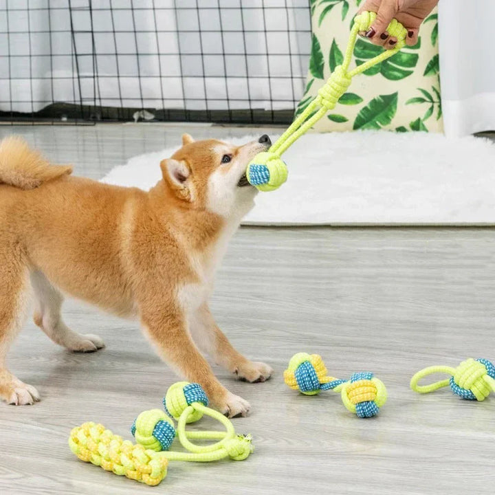 Knotted rope dog toy with fringe ends, perfect for tug-of-war and keeping dog's teeth clean.