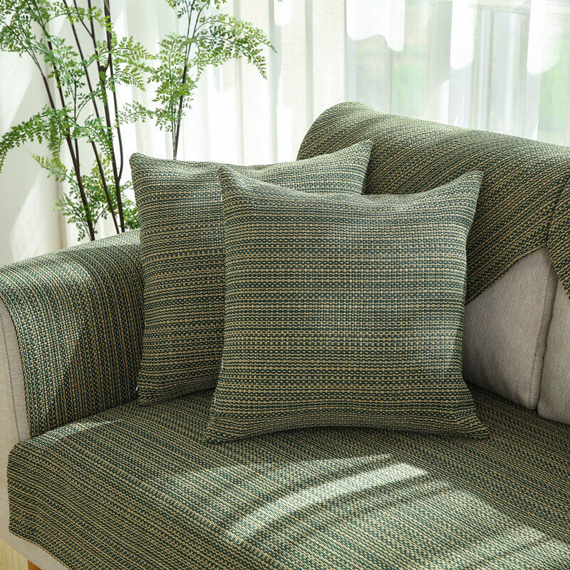 Pet dog resting comfortably on a handwoven anti-scratch linen couch cover