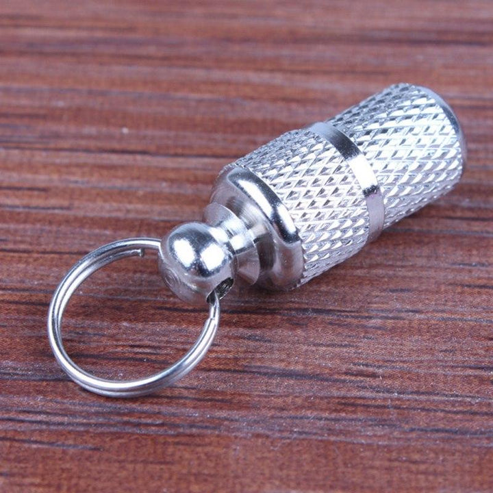 Metal pet ID tag, strong and long-lasting, providing reliable identification for dogs and cats on their collars.