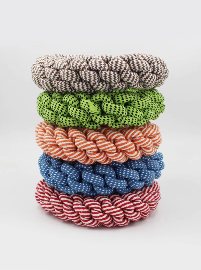 Dental care dog rope chew ring, durable and made from natural cotton for happy, healthy pets.