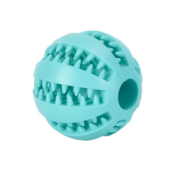 Close-up of a natural rubber dog chew ball, designed for aggressive chewers and dental care