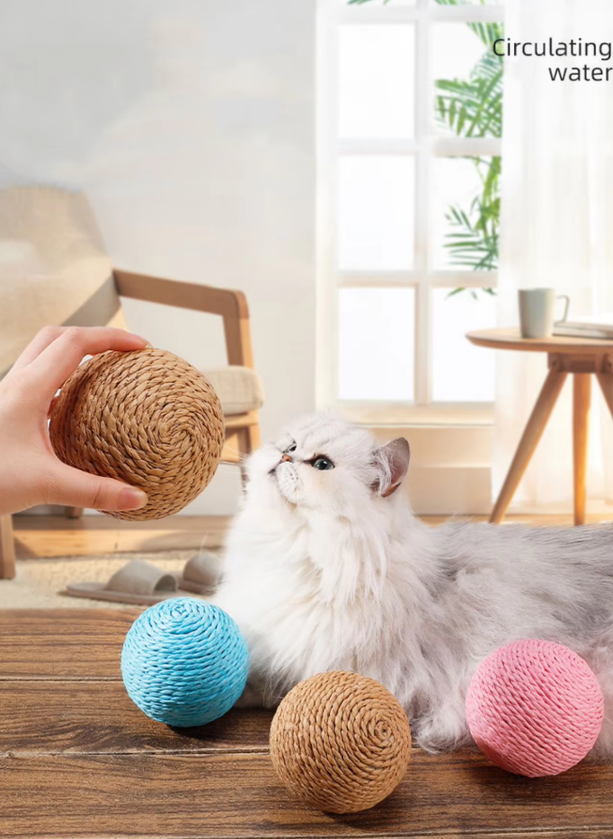 Natural sisal ball, a resilient cat toy offering scratching relief and engaging play for pets.
