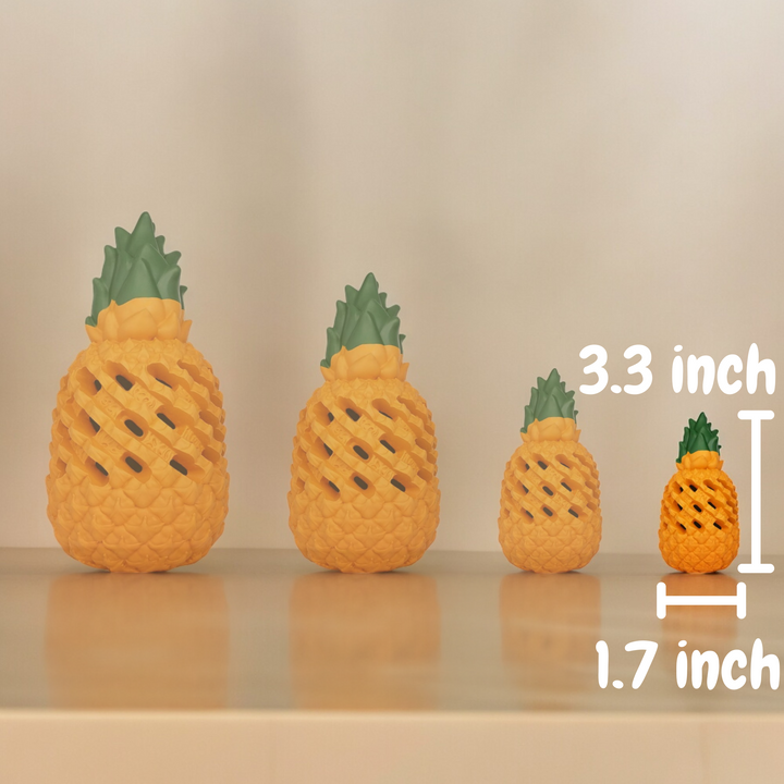 Pet enrichment: rubber pineapple treat dispenser toy, keeps dogs entertained for hours