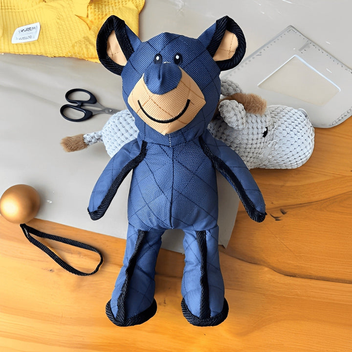 Interactive grey plush dog toy, chew resistant and durable, designed for medium to large breed dogs.