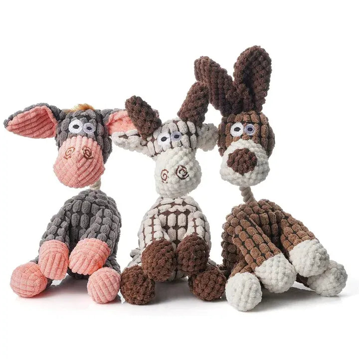 Aggressive chewer plush dog toy featuring an internal squeaker, pet-safe material
