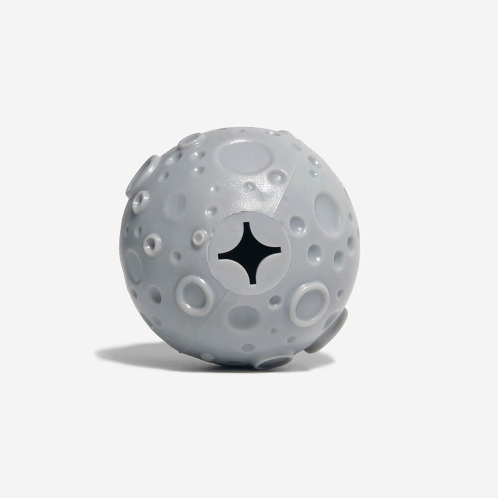Bouncy blue treat dispenser ball toy, perfect for dog training and interactive feeding
