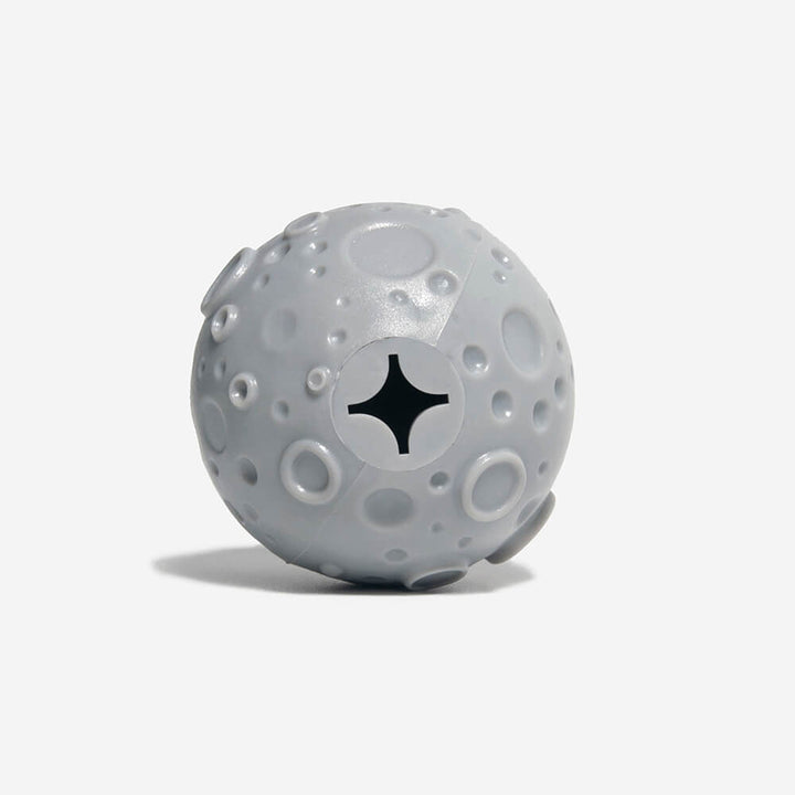 Bouncy blue treat dispenser ball toy, perfect for dog training and interactive feeding