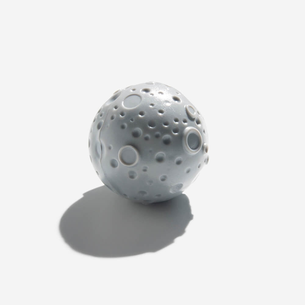 Pet supplies: interactive red treat dispensing ball, durable and bouncy for dogs