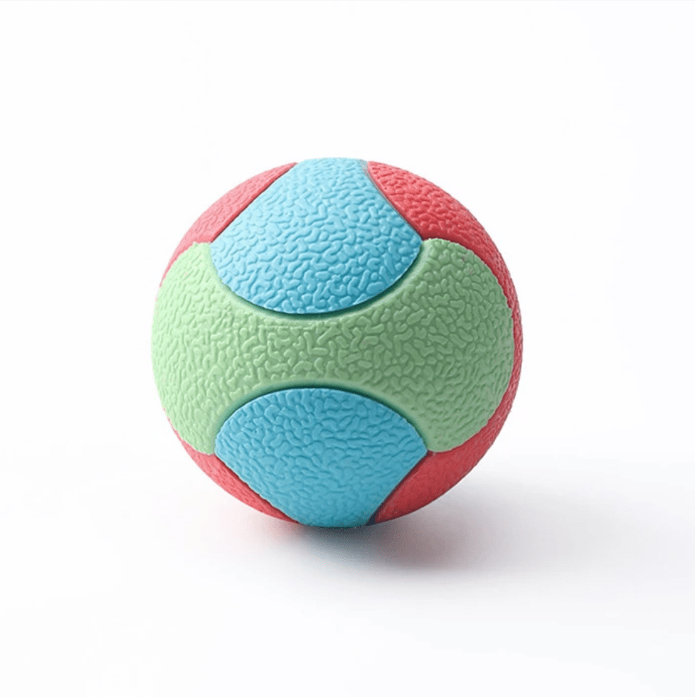 Durable red rubber bouncy ball dog toy for training and dental health