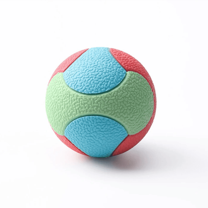 Durable red rubber bouncy ball dog toy for training and dental health