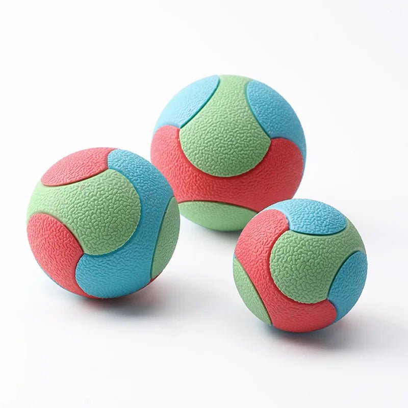 Yellow durable dog chew ball, an interactive pet toy and training aid that cleans teeth during play.